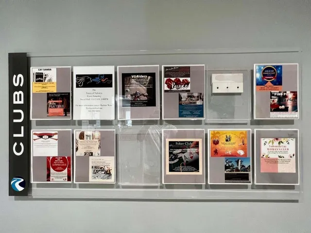 an aerial view of a house with a yard basket ball court and outdoor seating