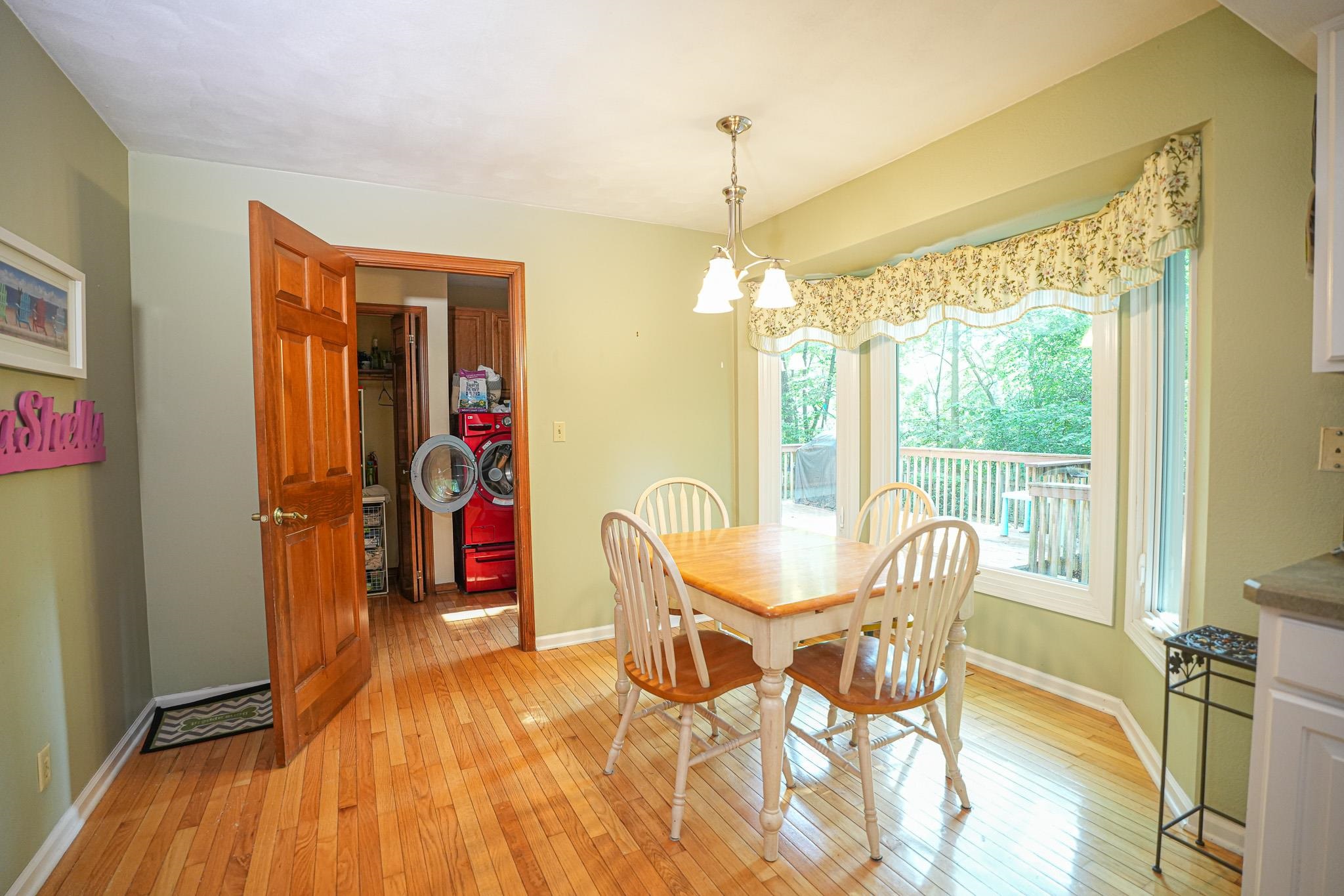 10340 William Trail Roscoe, IL 61073 - Photo 12 of 27 a view of a dining room with furniture window and outside view