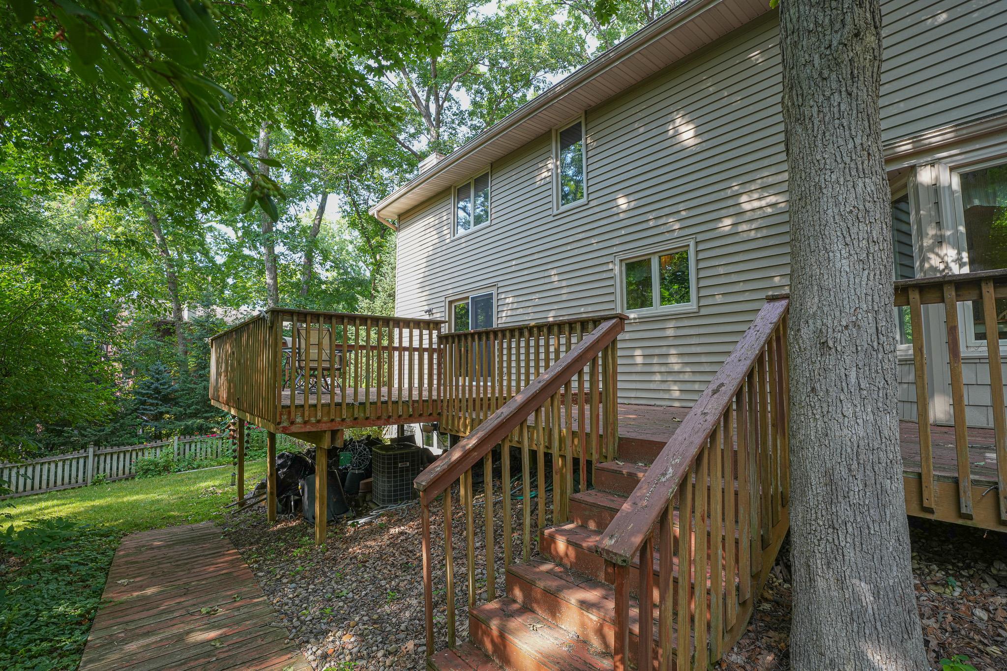 10340 William Trail Roscoe, IL 61073 - Photo 25 of 27 a view of a roof deck with chair and wooden floor