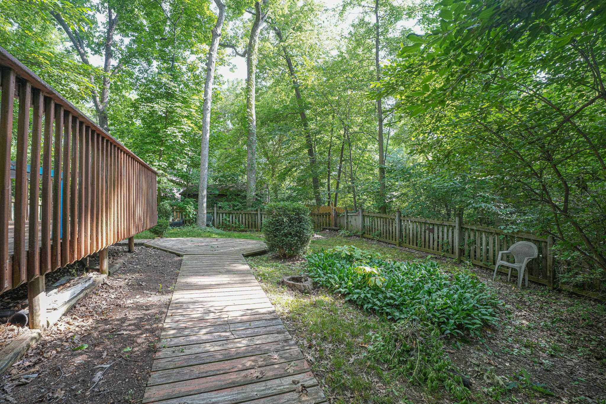 10340 William Trail Roscoe, IL 61073 - Photo 27 of 27 a backyard of a house with lots of green space