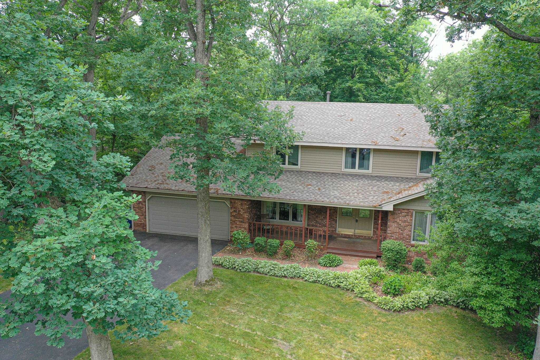 10340 William Trail Roscoe, IL 61073 - Photo 4 of 27 front view of a house with a yard