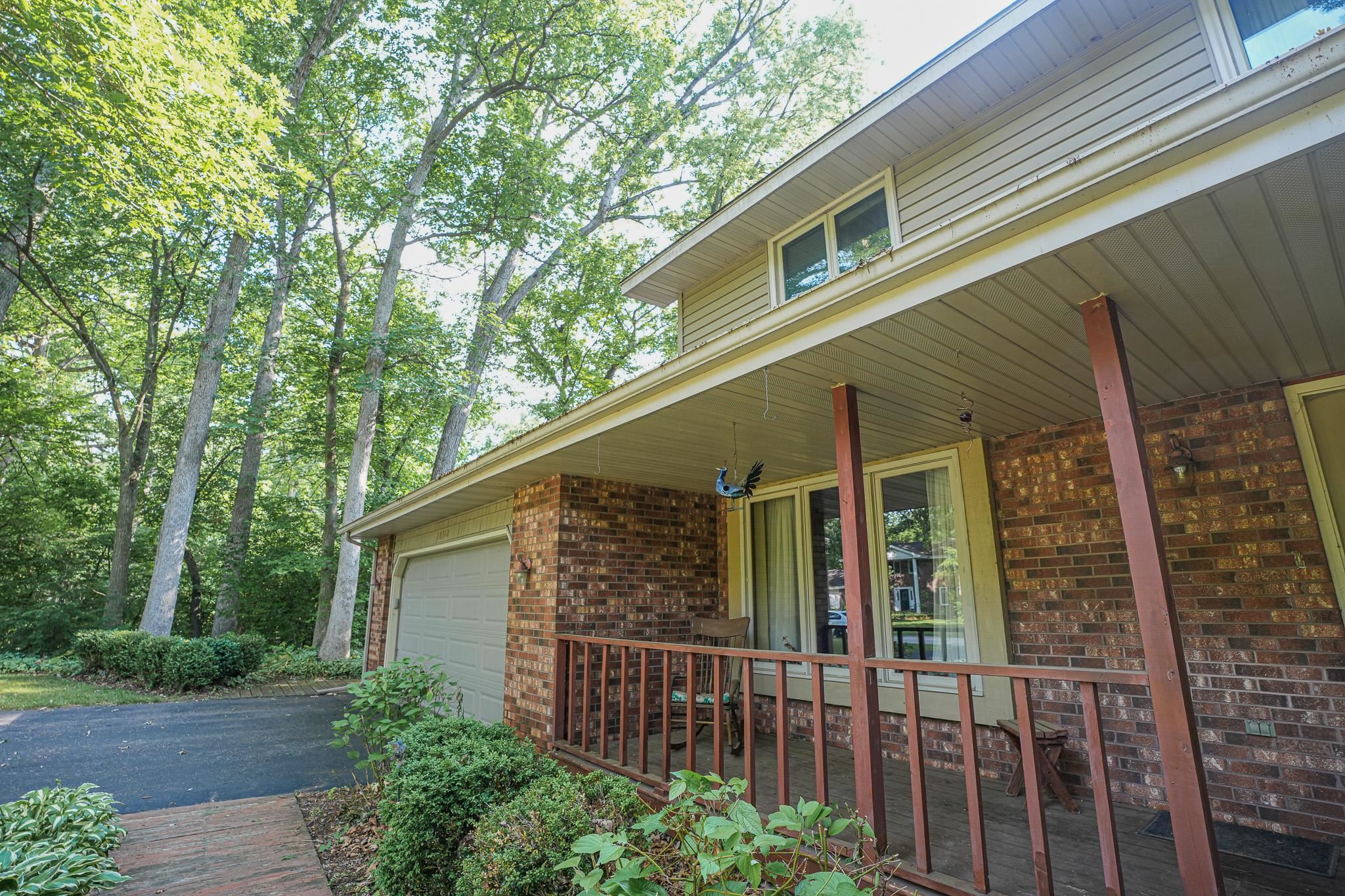 10340 William Trail Roscoe, IL 61073 - Photo 8 of 27 a view of a house with a yard