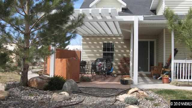 15075 Gooding Drive Reno, NV 89508 - Photo 7 of 9 a view of a building with sitting area