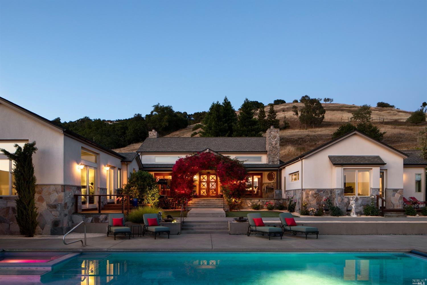 4080 Lovall Valley Loop Road Sonoma, CA 95476 - Photo 1 of 1 a view of the patio with dining table and chairs with plants
