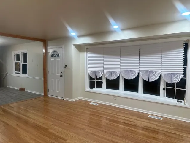 a view of a house with a large window