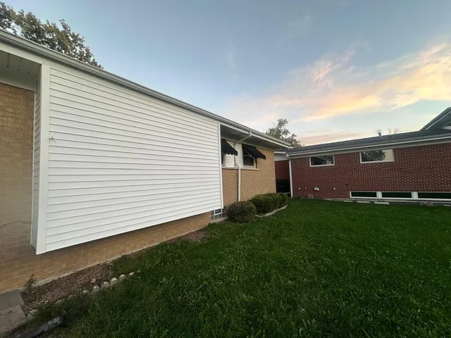 a backyard of a house with lots of green space
