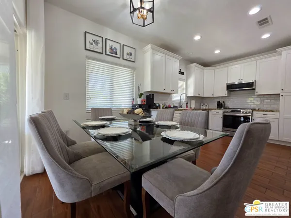 a view of a dining room with furniture
