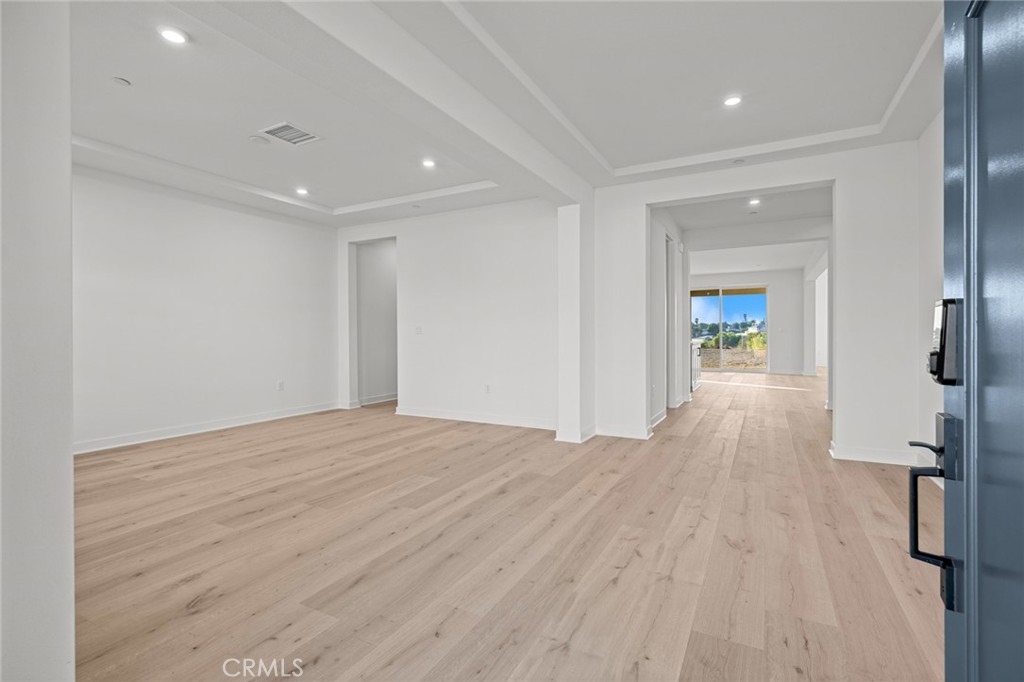 16642 Ginger Creek Drive Riverside, CA 92504 - Photo 19 of 22 a view of livingroom with hardwood floor and a ceiling fan