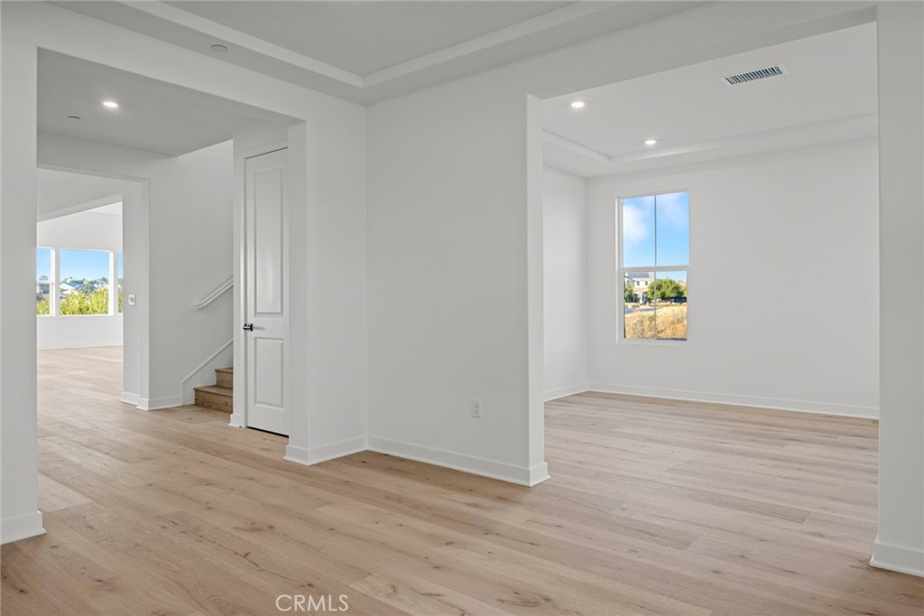 16642 Ginger Creek Drive Riverside, CA 92504 - Photo 20 of 22 wooden floor in an empty room with a window