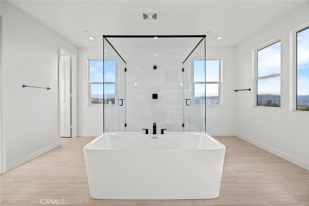 16642 Ginger Creek Drive Riverside, CA 92504 - Photo 4 of 22 a bathroom with a sink and a mirror