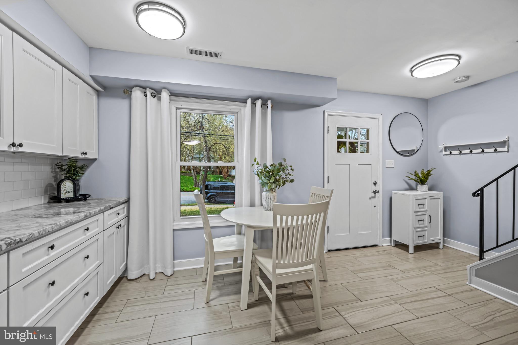 129 McKinsey Road Severna Park, MD 21146 - Photo 12 of 38 a dining room with furniture and window