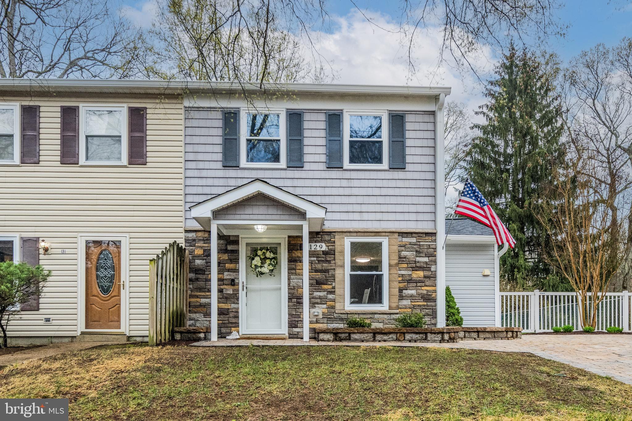 129 McKinsey Road Severna Park, MD 21146 - Photo 2 of 38 front view of a house with a yard