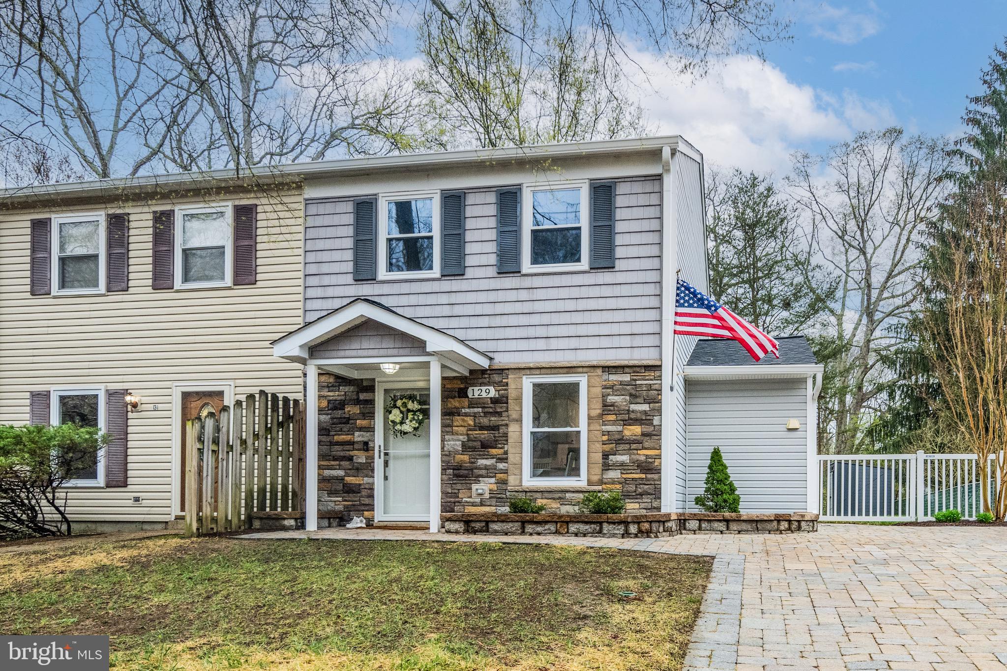 129 McKinsey Road Severna Park, MD 21146 - Photo 3 of 38 a front view of a house with a yard