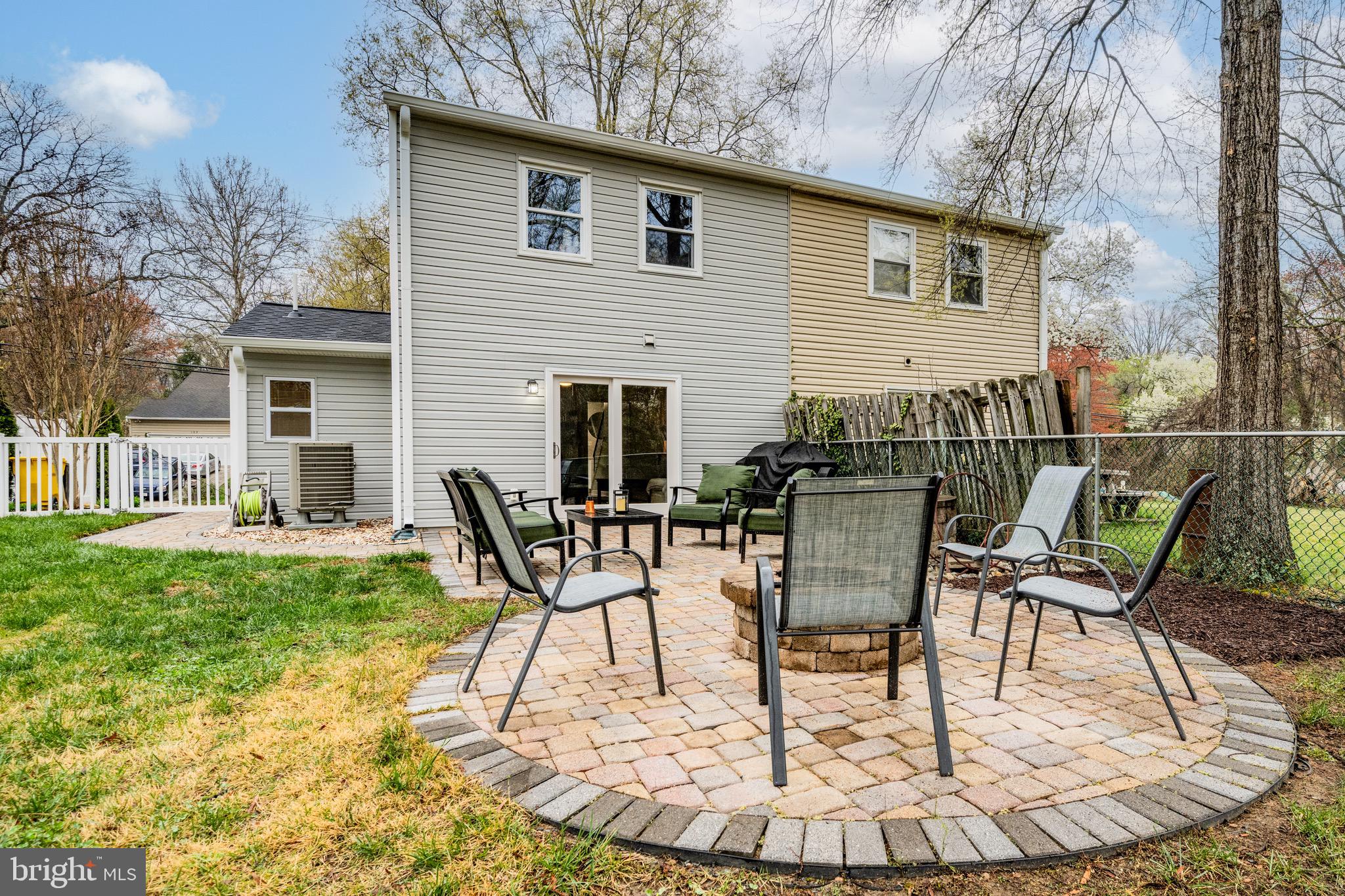 129 McKinsey Road Severna Park, MD 21146 - Photo 31 of 38 a view of a house with backyard sitting area and garden
