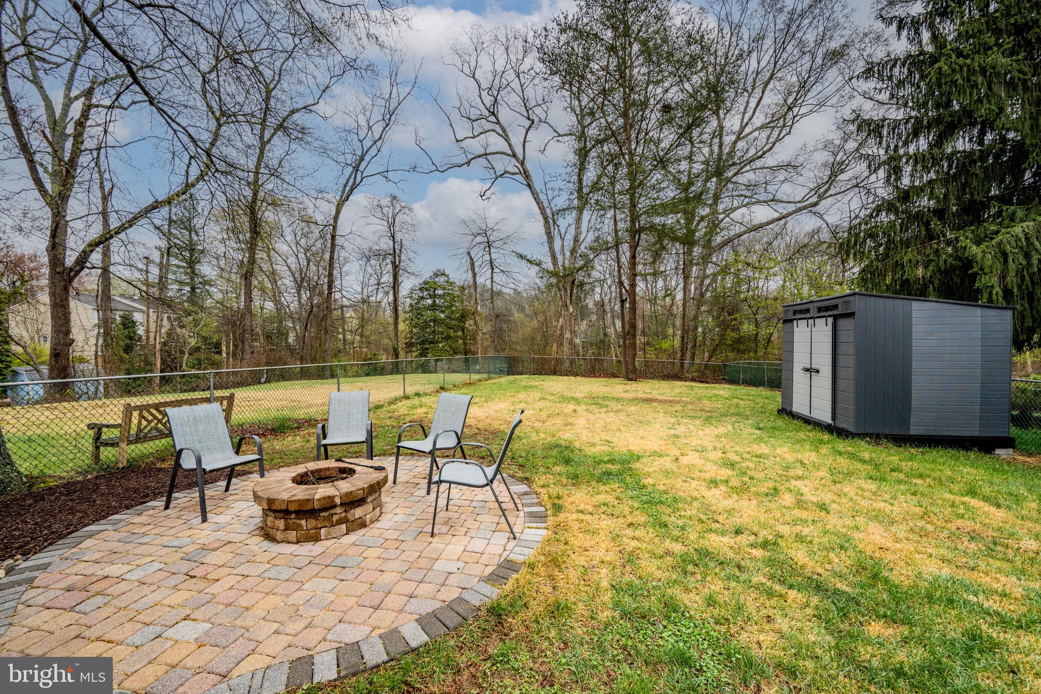 129 McKinsey Road Severna Park, MD 21146 - Photo 34 of 38 a view of backyard with swimming pool and seating space