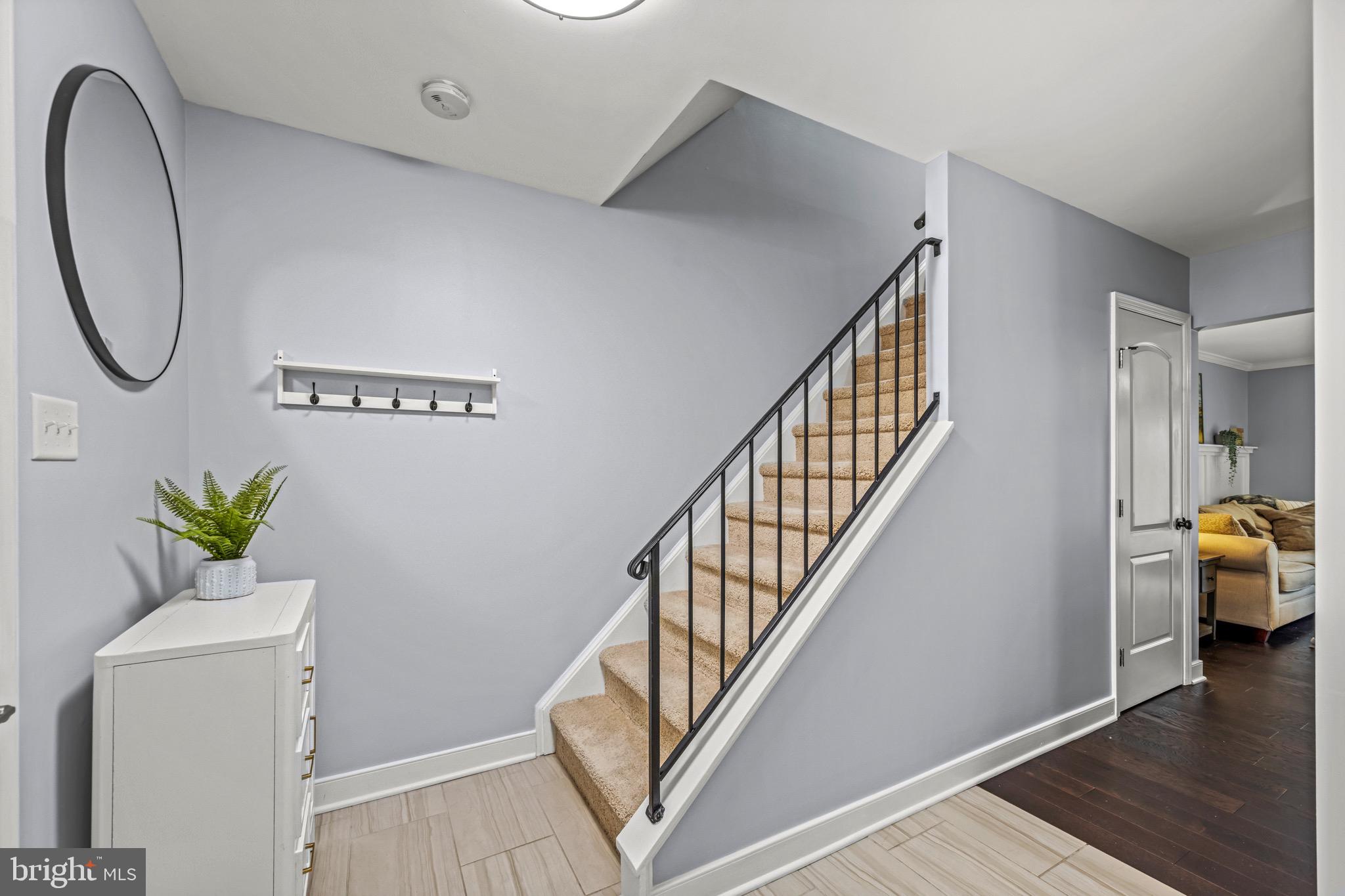 129 McKinsey Road Severna Park, MD 21146 - Photo 9 of 38 a view of an entryway with wooden floor