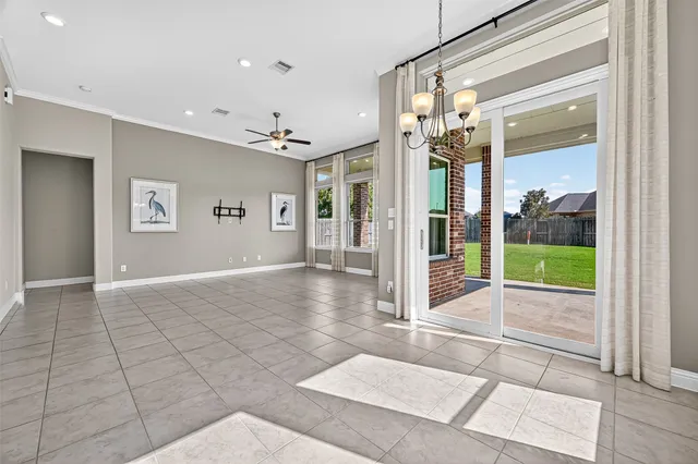 a view of a kitchen with a sink and a stove top oven