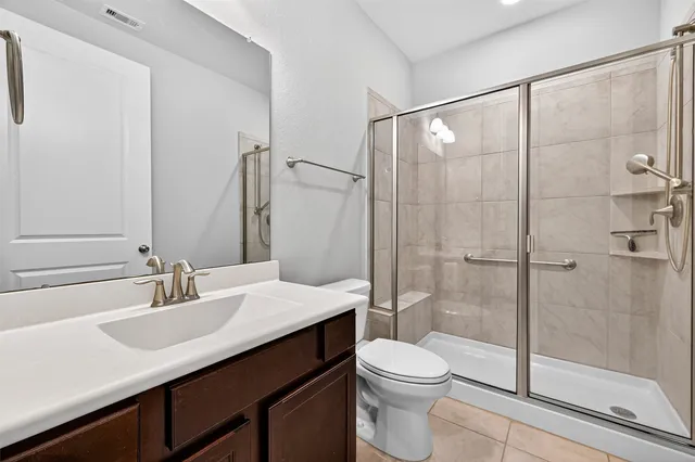 a view of a livingroom with a ceiling fan and window