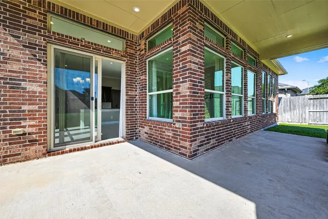 a view of a back yard of a house