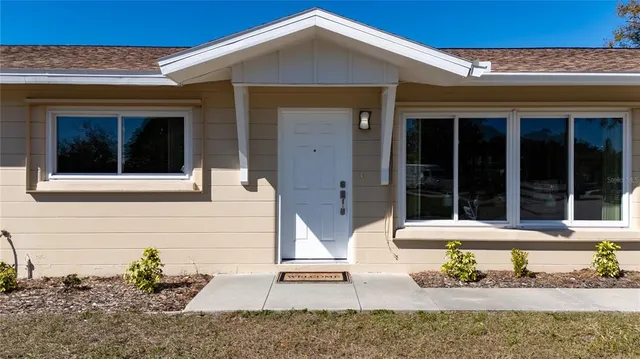 a front view of a house with a porch