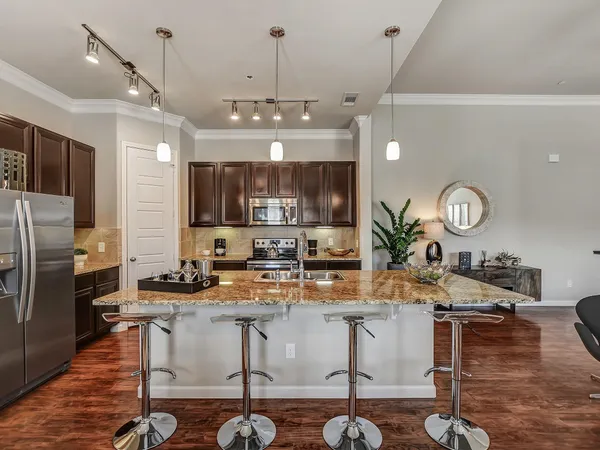 a kitchen with counter space cabinets and appliances