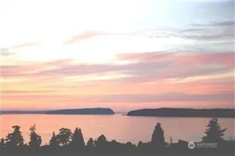 a view of lake and mountain