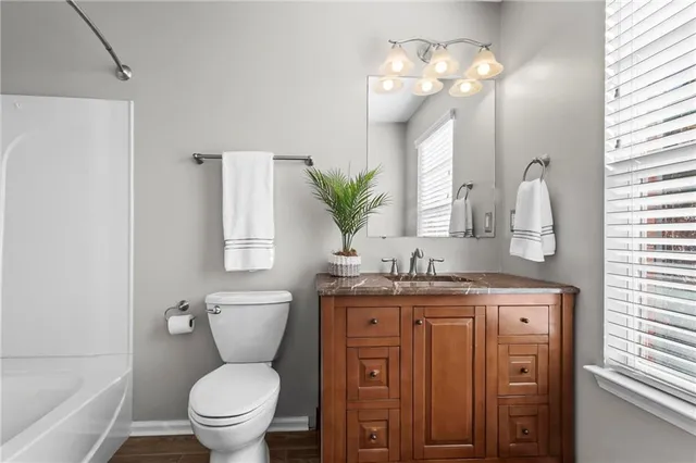 a view of balcony with wooden floor