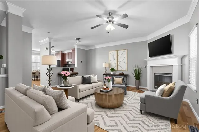 a living room with furniture fireplace and a flat screen tv