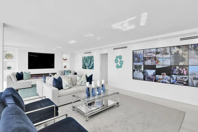 a kitchen with a sink and a stove top oven