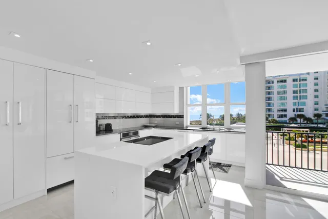 a bathroom with a shower sink and mirror