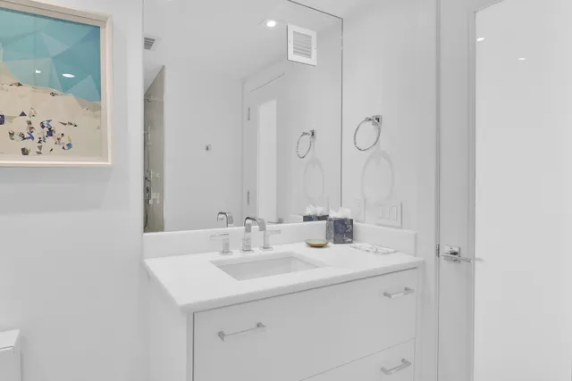 a view of a lake with a building in the background