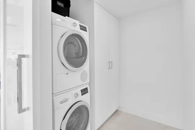 a view of a swimming pool with a lounge chair