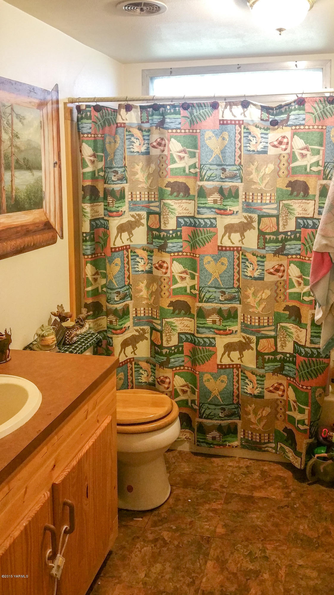 931 Liberty Road Outlook, WA 98938 - Photo 8 of 12 a bathroom with a sink toilet and shower