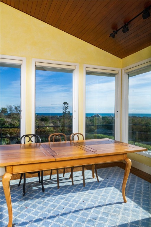 60 Beacon Hill Road Newport, RI 02840 - Photo 11 of 30 Great open kitchen family room with fireplace , east and south facing. Greet the morning sun and stunning ocean views, exceptional setting.