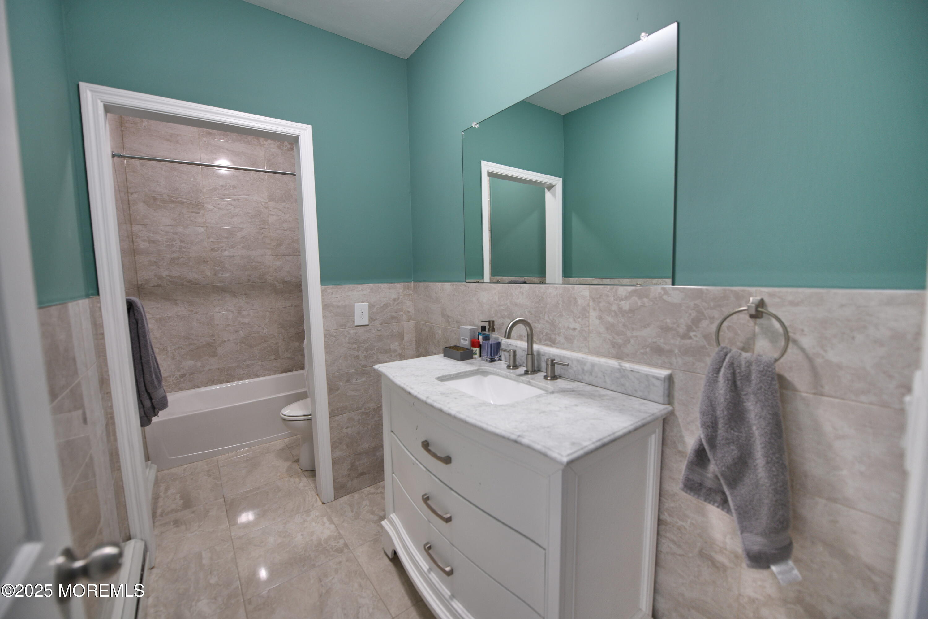 2262 Allenwood Road Allenwood, NJ 08720 - Photo 11 of 21 a bathroom with a sink a toilet and shower