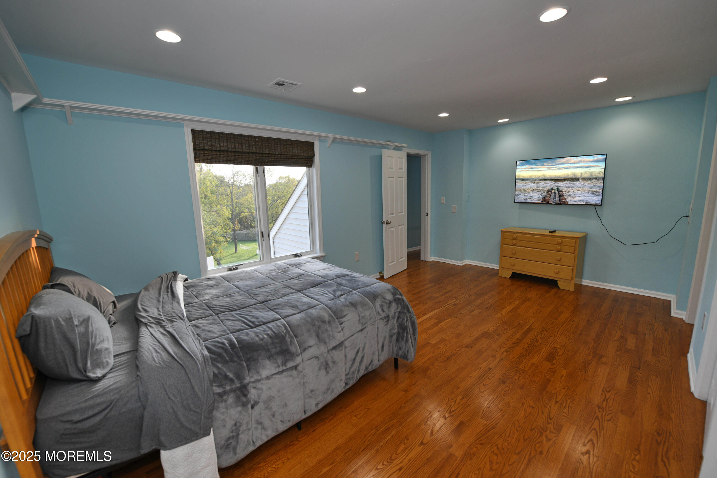 2262 Allenwood Road Allenwood, NJ 08720 - Photo 17 of 21 a bedroom with a bed and a large window