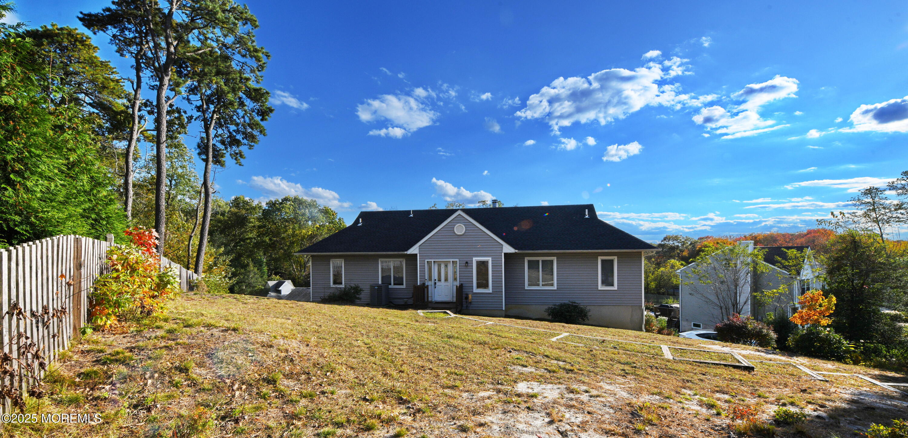 2262 Allenwood Road Allenwood, NJ 08720 - Photo 2 of 21 a front view of a house with a yard and garage