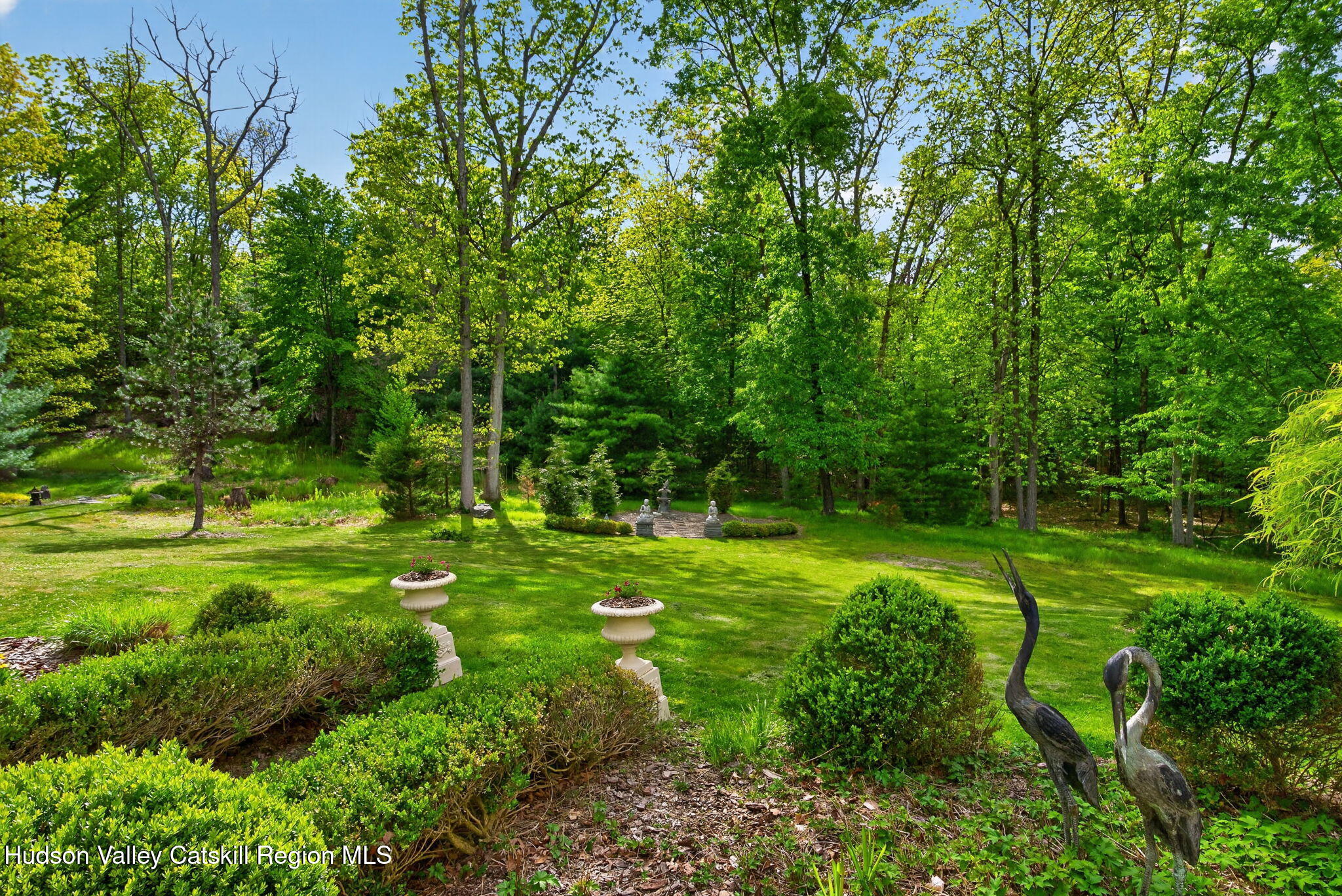 189 Bush Road Stone Ridge, NY 12484 - Photo 52 of 60 a view of a grassy field with trees