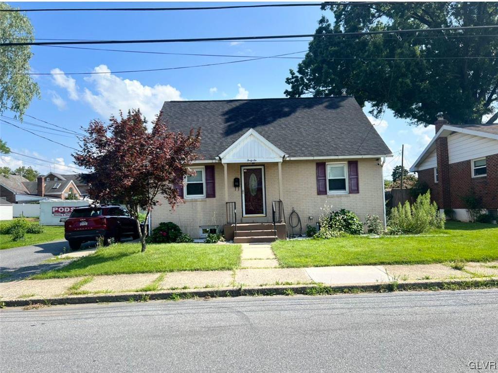 46 East Federal Street Allentown, PA 18103 - Photo 1 of 14 a front view of a house with a yard and garage
