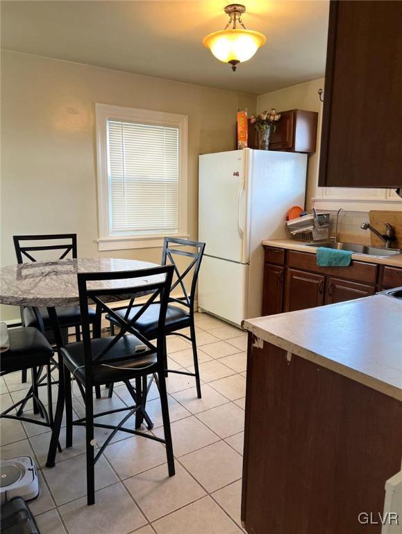 46 East Federal Street Allentown, PA 18103 - Photo 11 of 14 a dining room with a desk and chairs with wooden floor