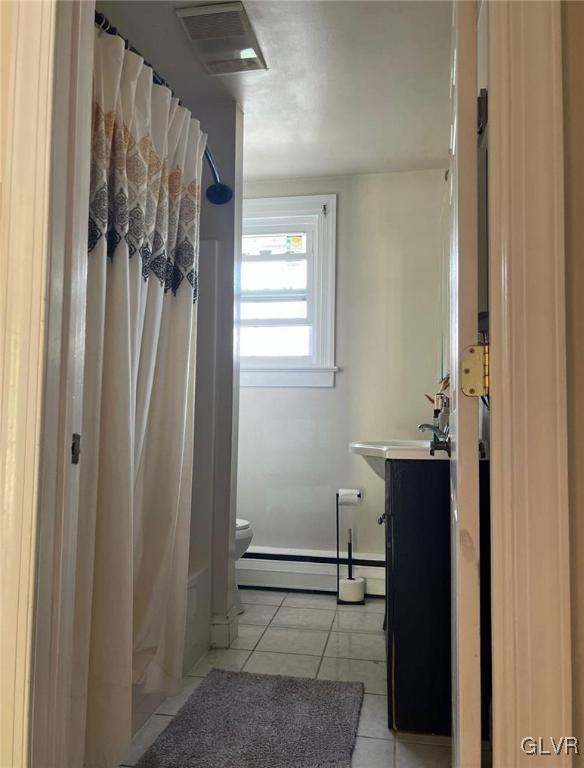 46 East Federal Street Allentown, PA 18103 - Photo 10 of 14 a bathroom with a shower and a sink