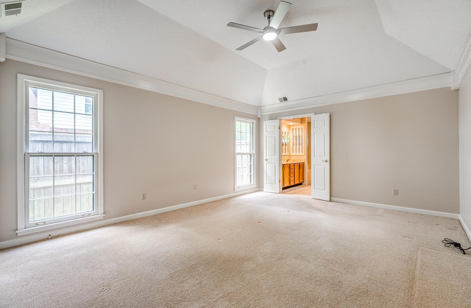 8198 Walnut Creek Road Memphis, TN 38018 - Photo 17 of 32 10' coffered ceiling with crown molding and NEW ceiling fan/light.