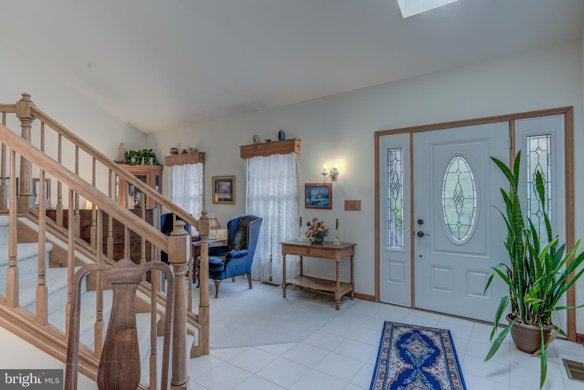 23 Canal Road Ocean Pines, MD 21811 - Photo 5 of 18 Ceramic tile foyer/hall with skylights