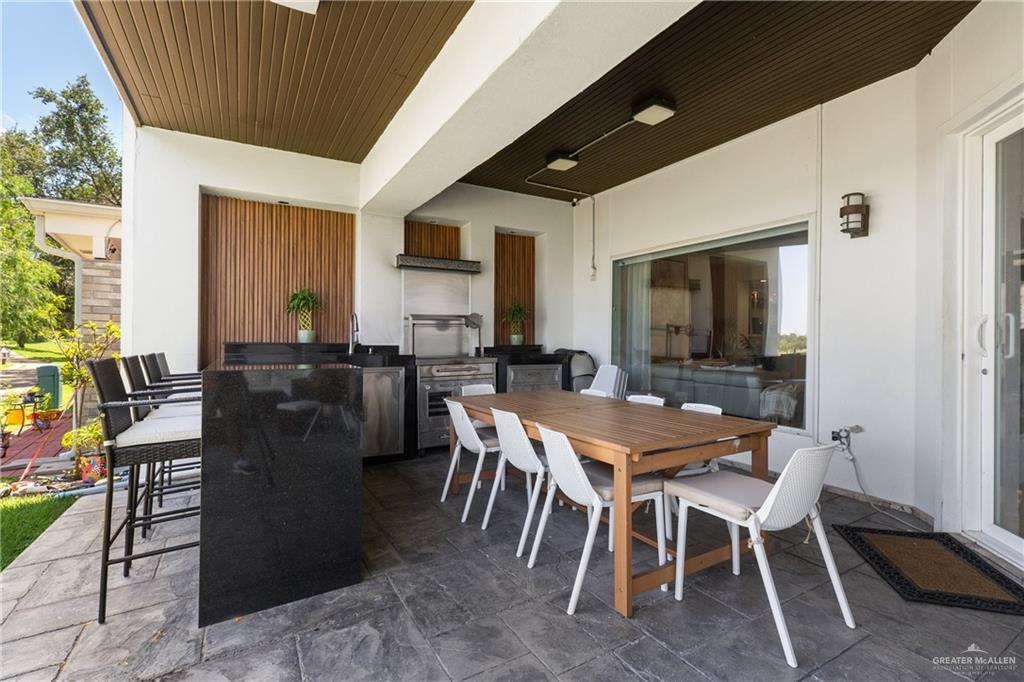 514 Rio Grande Drive Mission, TX 78572 - Photo 23 of 28 a view of a dining room with furniture