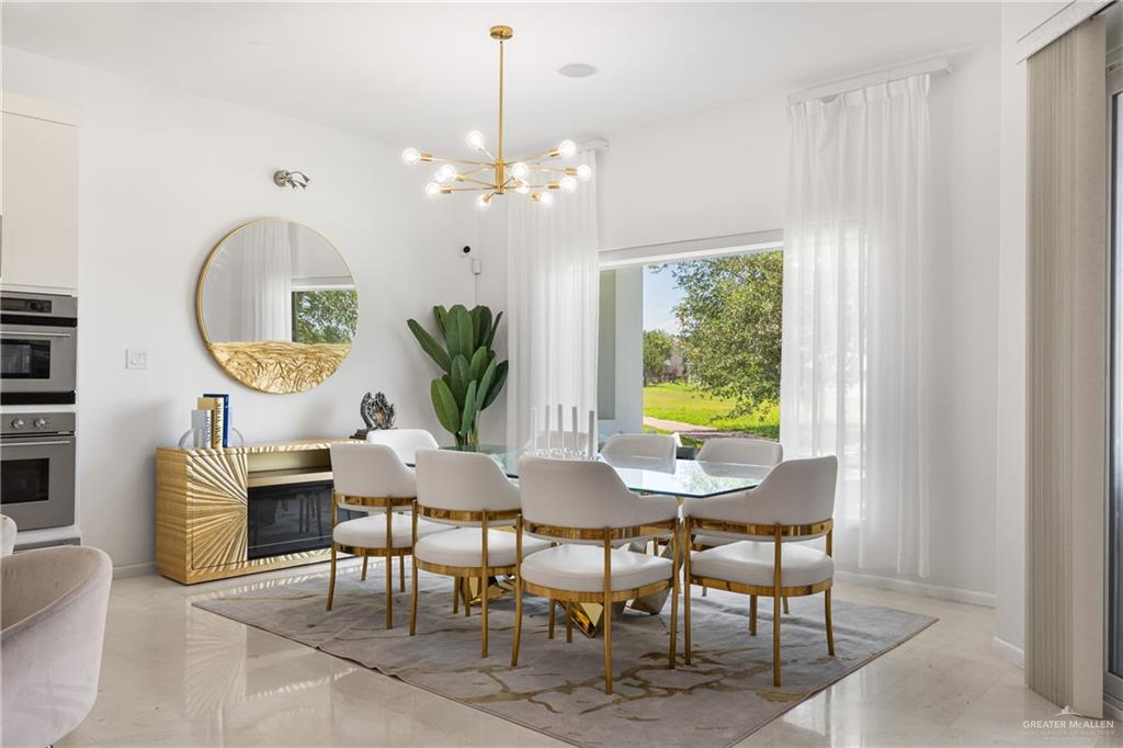514 Rio Grande Drive Mission, TX 78572 - Photo 6 of 28 a view of a dining room with furniture window and outside view