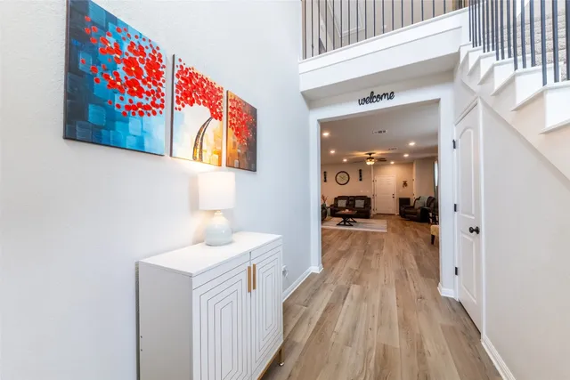 a view of a bedroom from a hallway