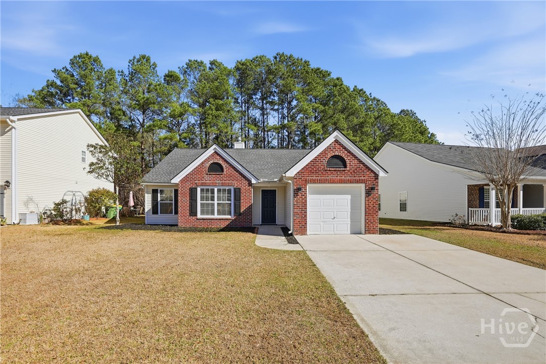 5 Hamilton Grove Drive Pooler, GA 31322 - Photo 1 of 28 Front of the home with new roof, brick front, and brick garage
