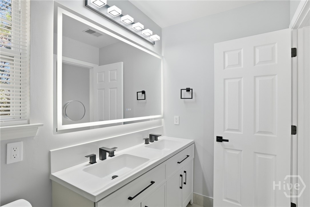 5 Hamilton Grove Drive Pooler, GA 31322 - Photo 17 of 28 Primary bathroom with LED mirror and dual vanity