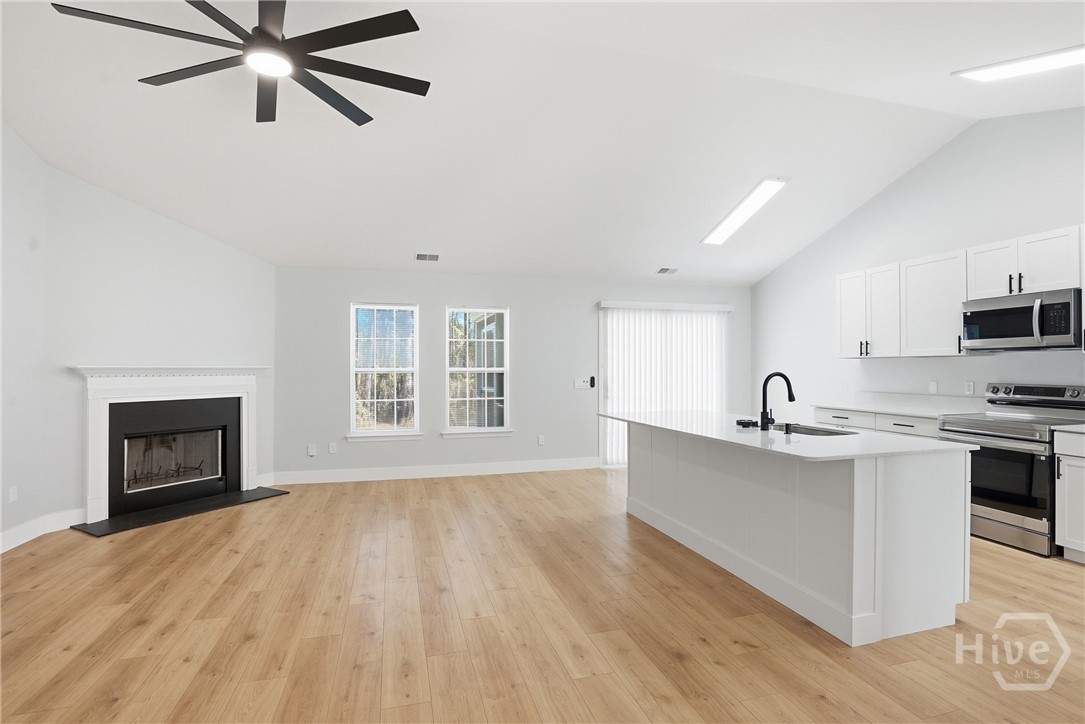 5 Hamilton Grove Drive Pooler, GA 31322 - Photo 9 of 28 Kitchen, breakfast area, and living area