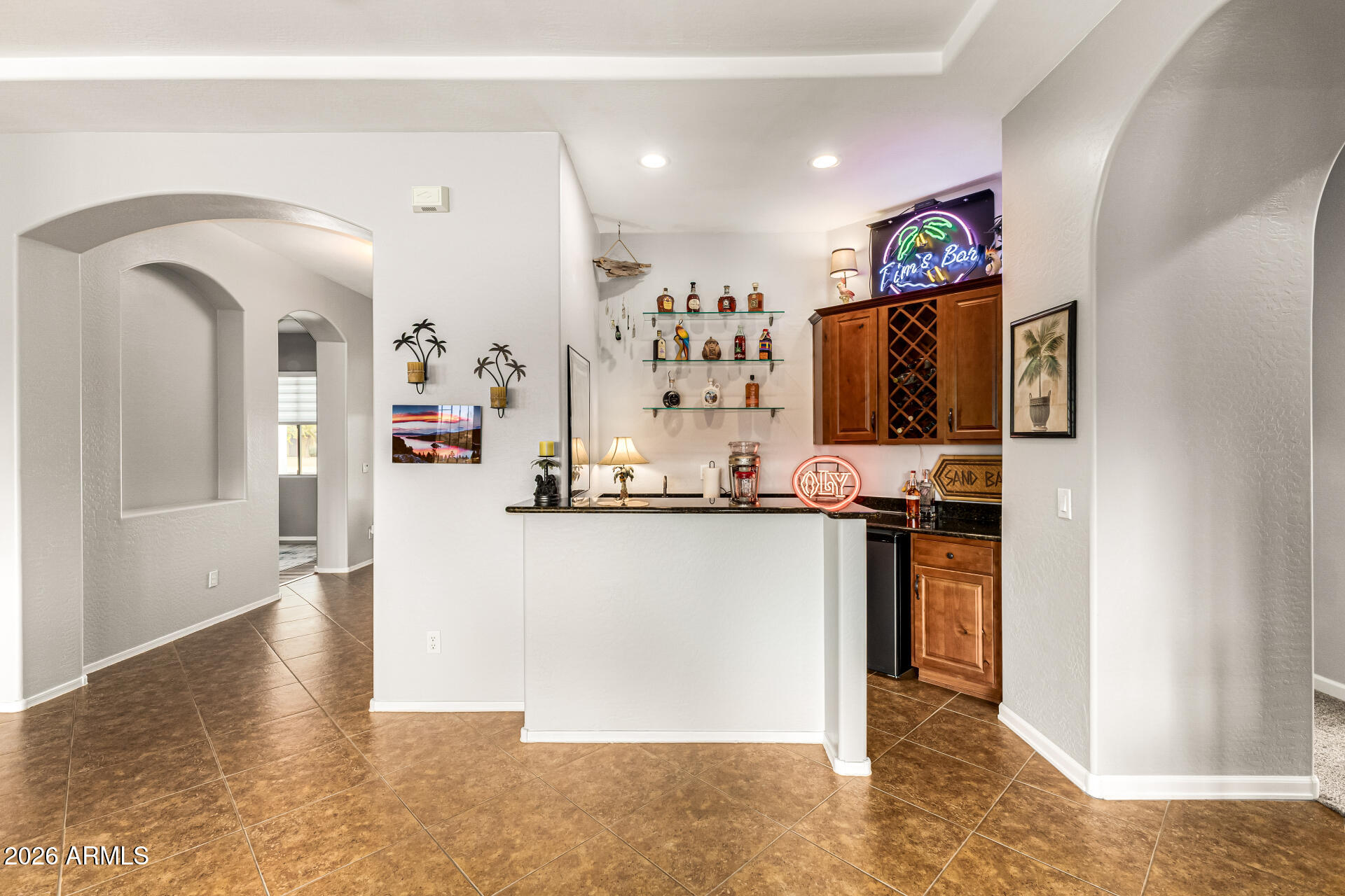 22909 West Sierra Ridge Way Wittmann, AZ 85361 - Photo 22 of 121 a view of a kitchen with refrigerator and window